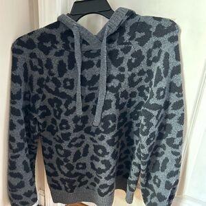 Women’s Size Small hooded pullover. Sweater material.